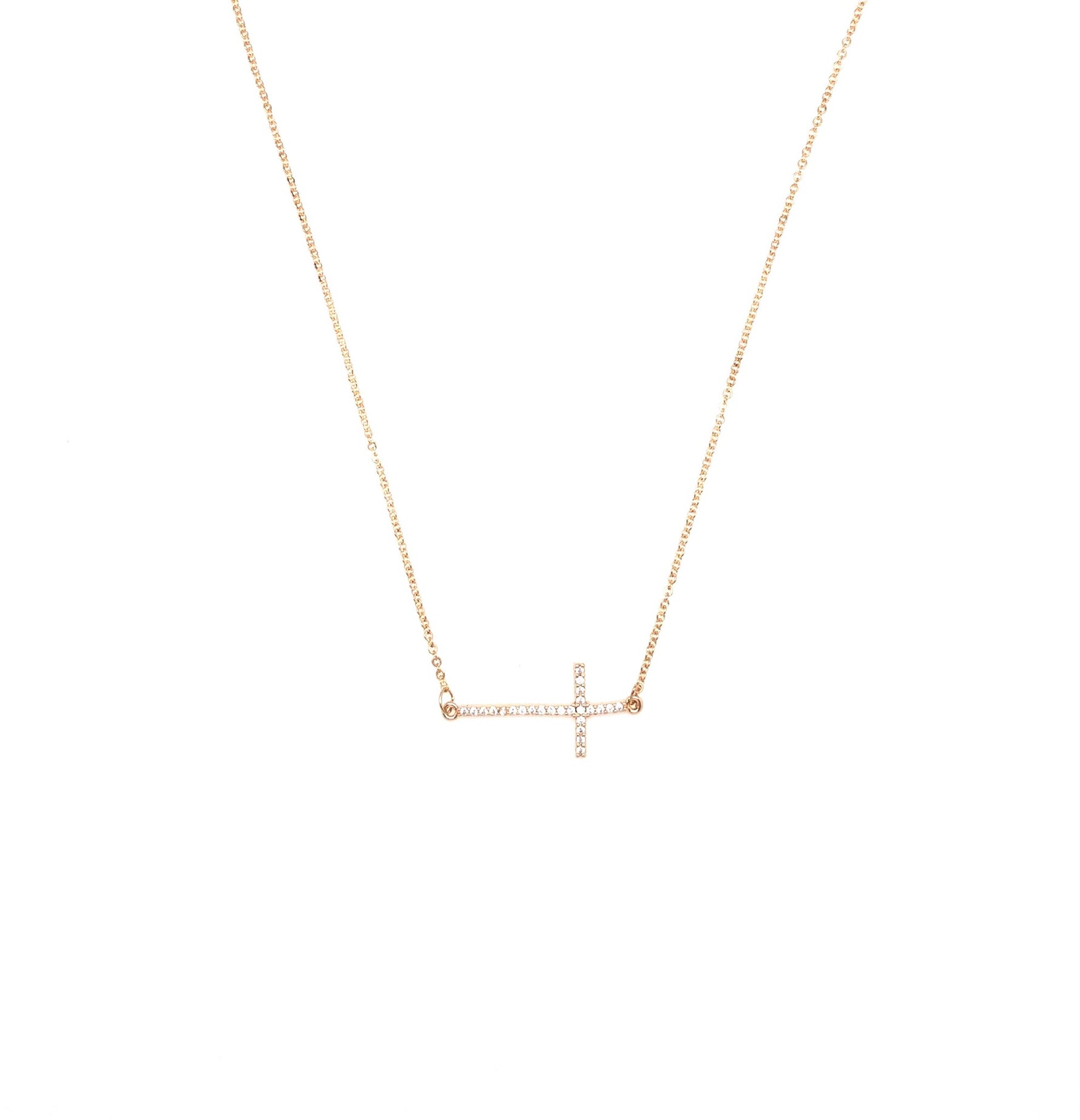 Gold sideways cross necklace. 