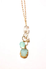 Aqua Druzy wear it 2 ways necklace  styled long on flat lay 