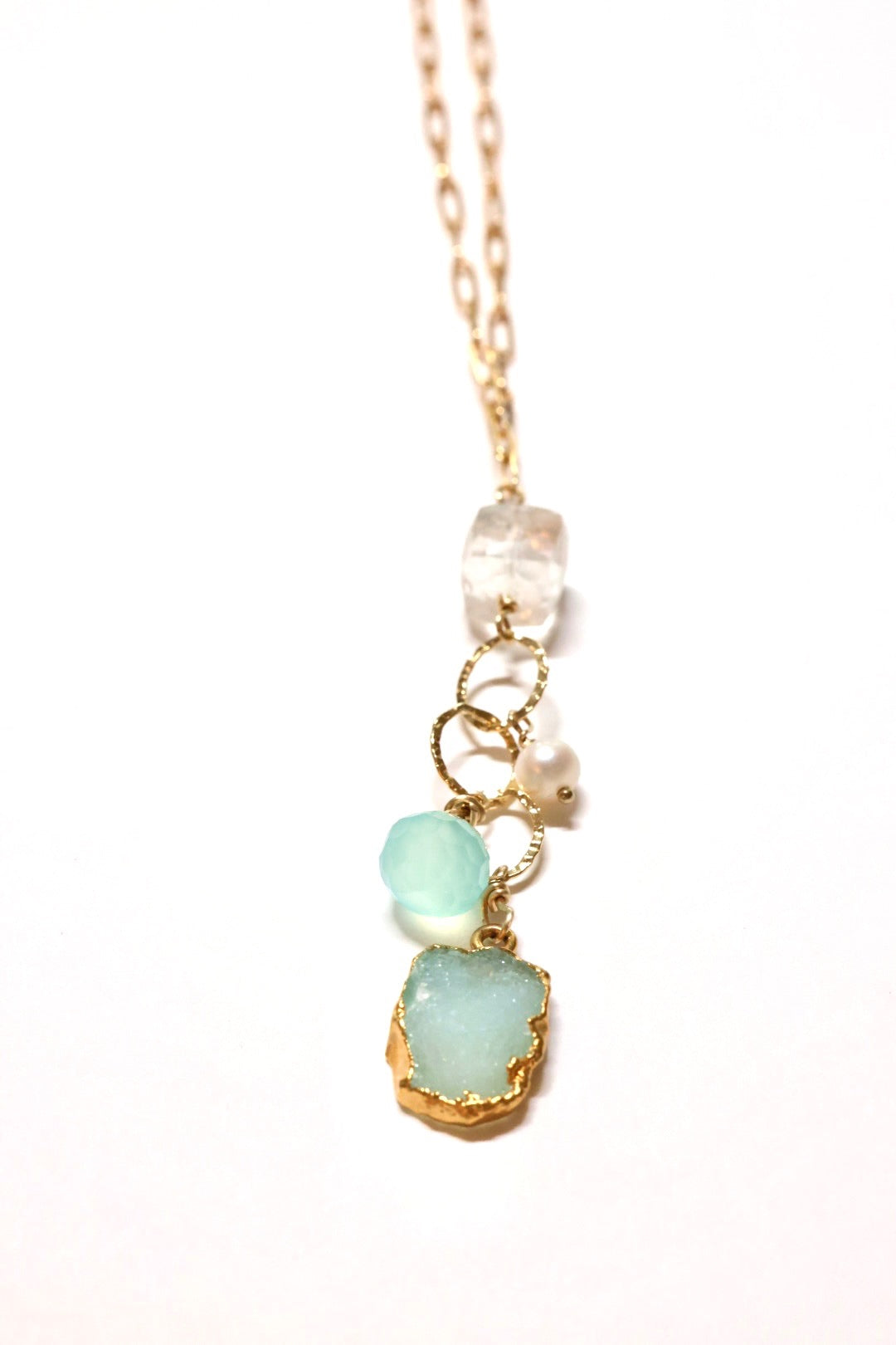 Aqua Druzy wear it 2 ways necklace  styled long on flat lay 