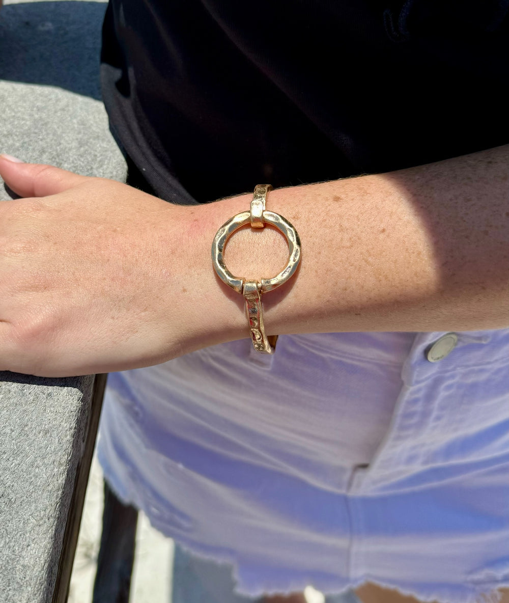 Shelby Circle Bracelet in gold shown on model