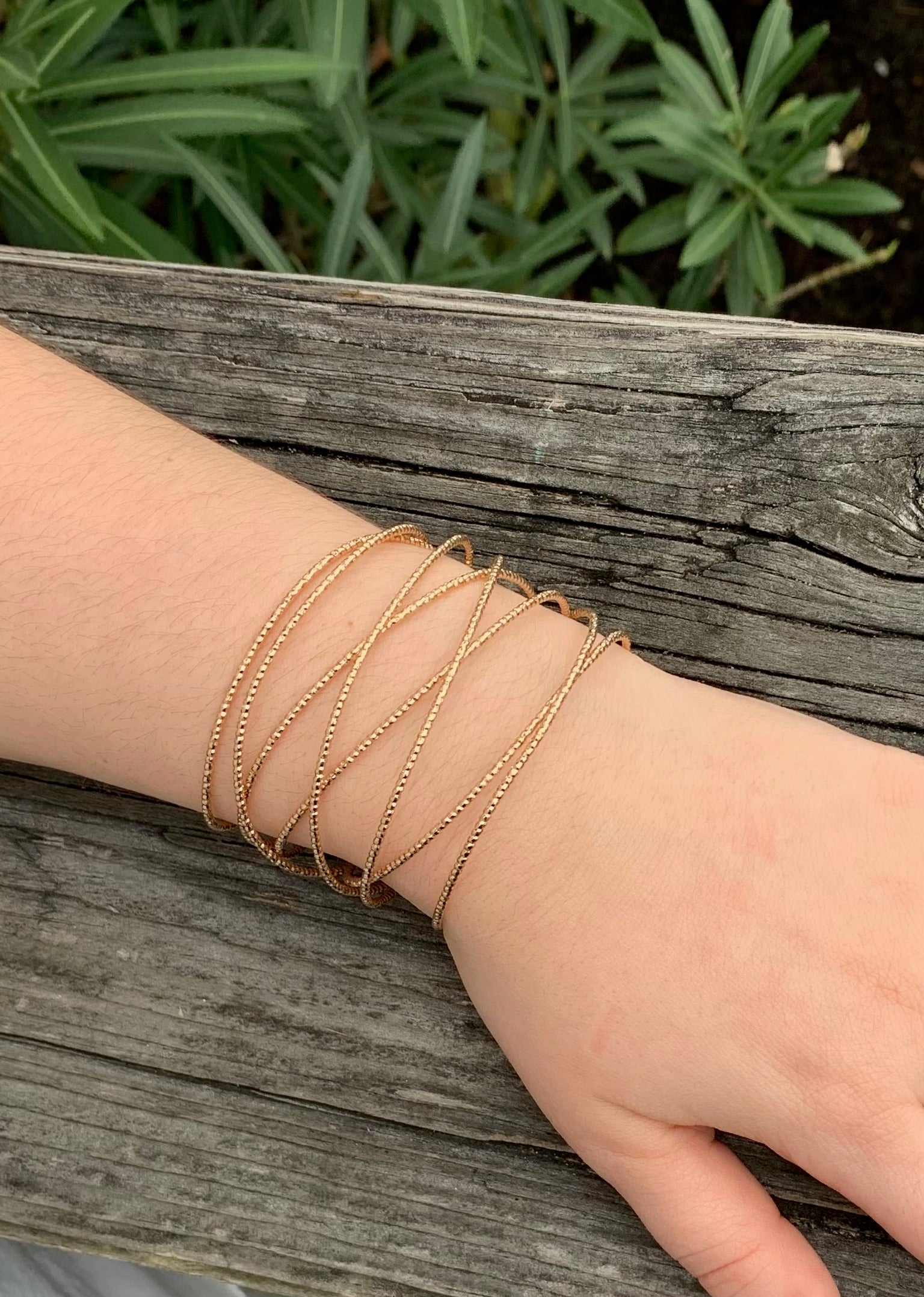 Athea Gold cuff on model 