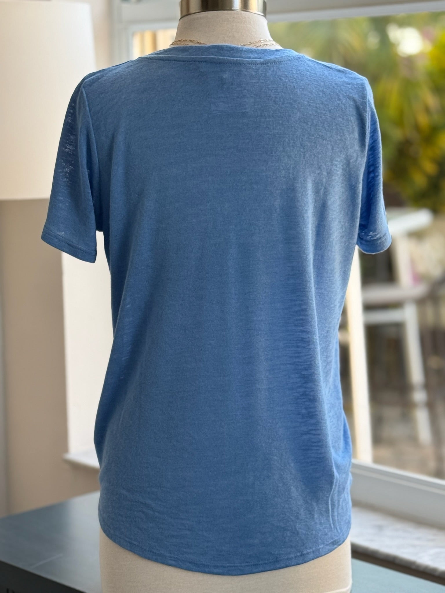 backside blue tee shirt