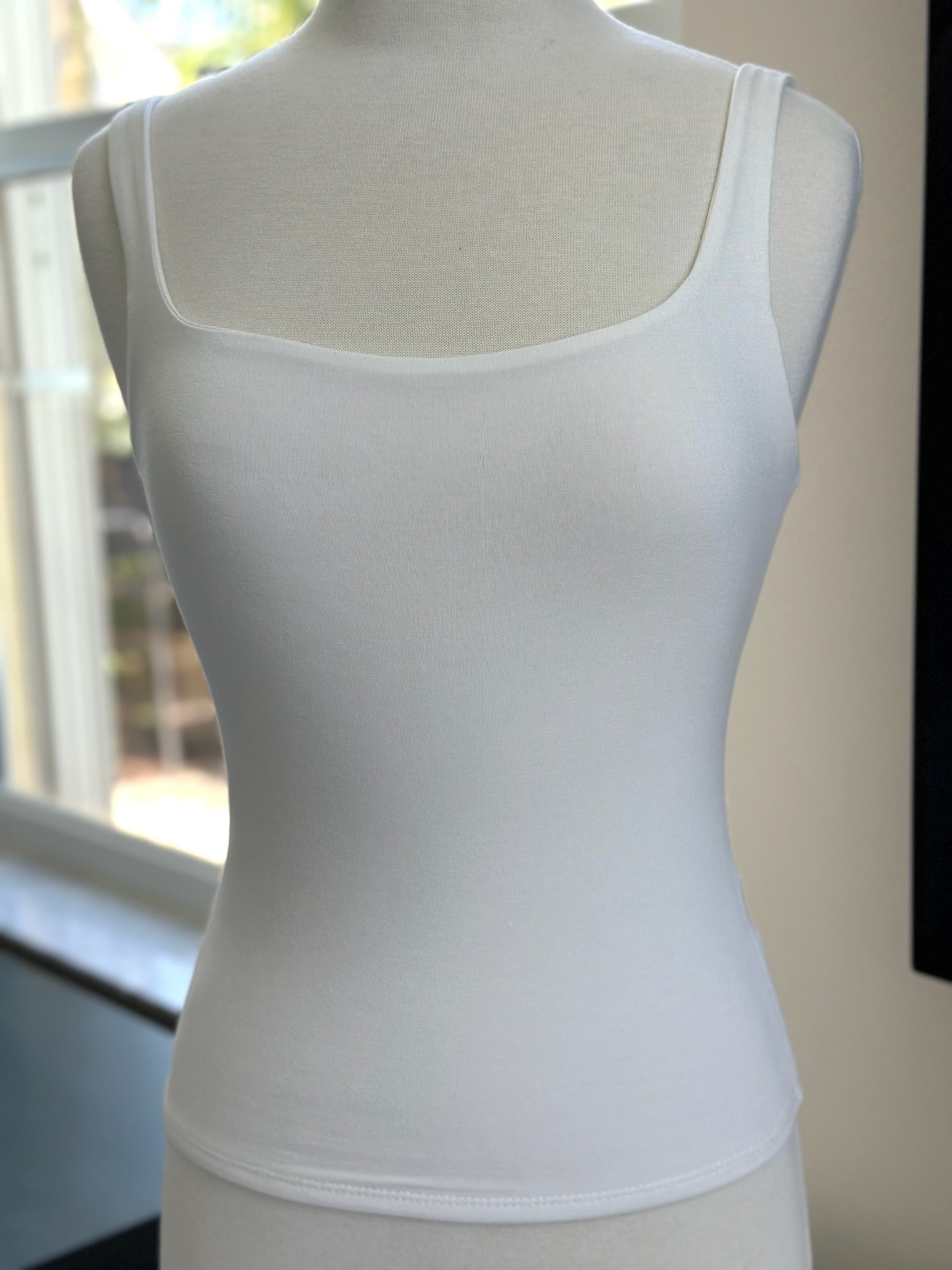 Caroline sure neck tank on mannequin 