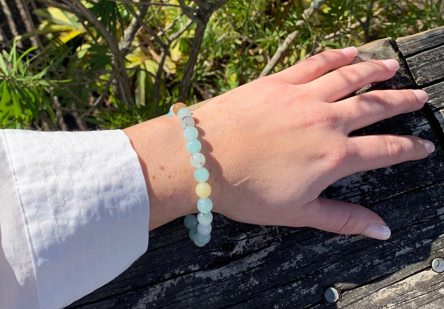 agate bracelet. all real stones turned to beads. blues, tans, greys, greens Danna on model