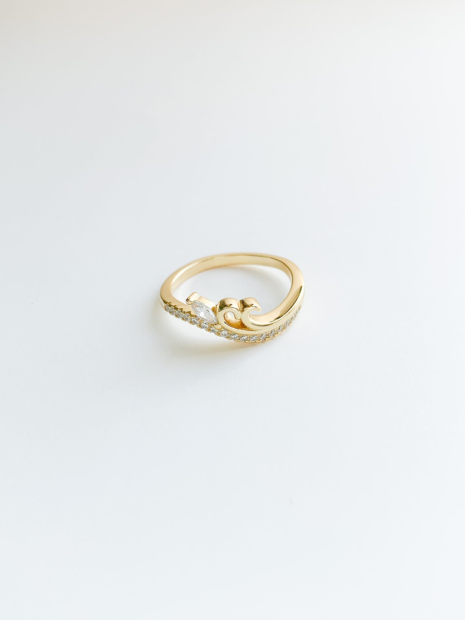 Magical sparkling wave ring in gold over sterling