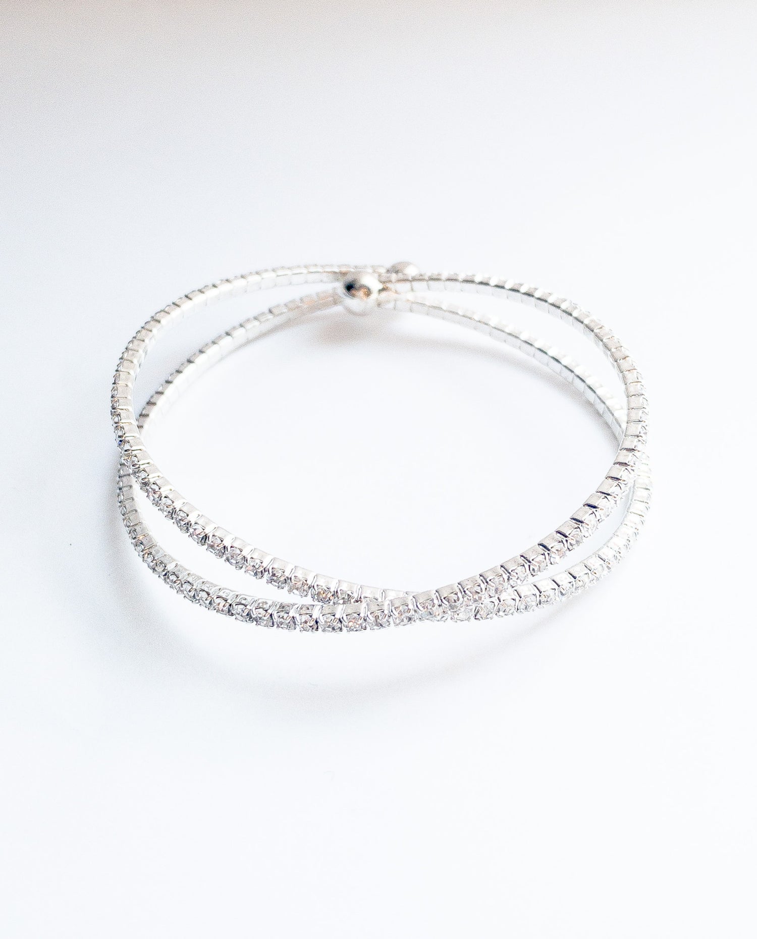 kara crossover bracelet. tiny crystals. silver cuff