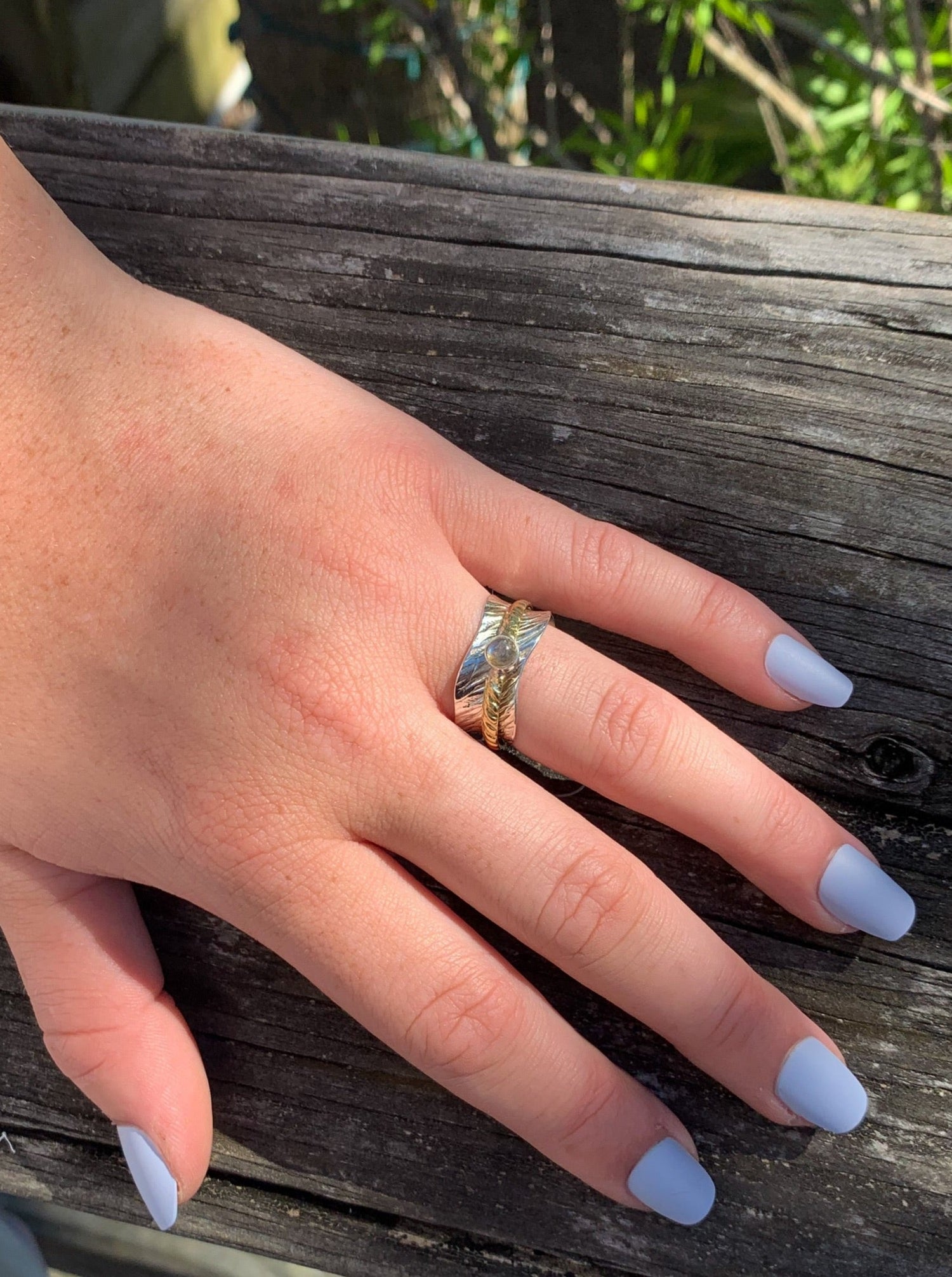 Valentina spinner ring labradorite on model 